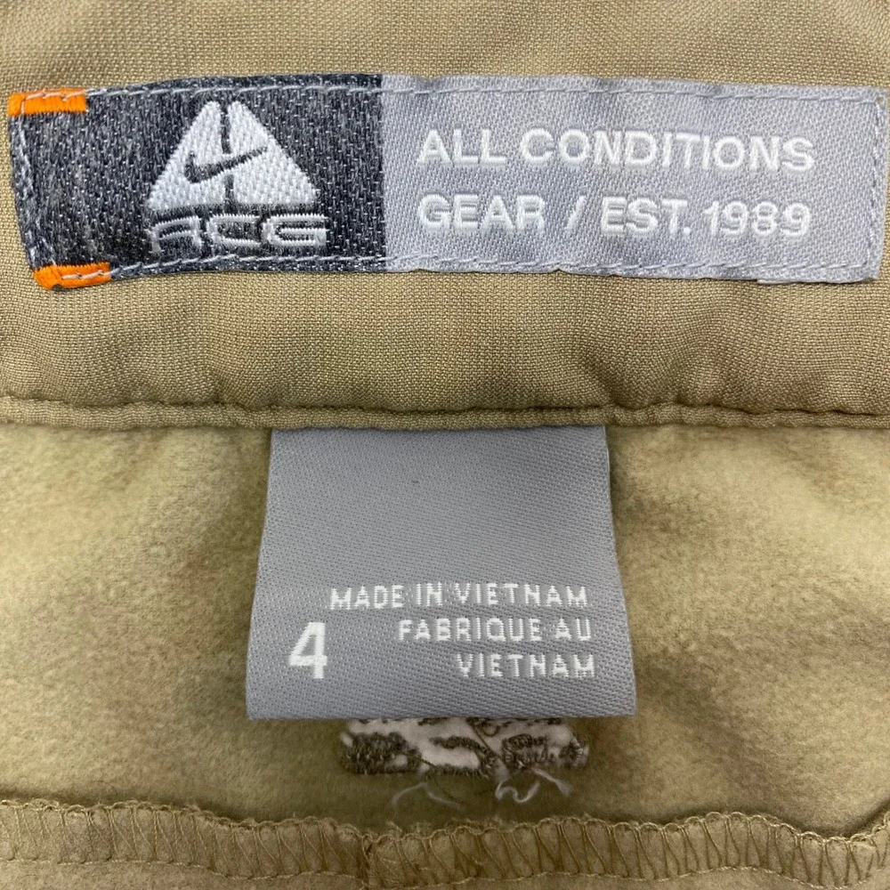 Nike ACG‎ Softshell Cargo Pants Womens 4 Tan Fleece Lined Hiking Utility Bungee